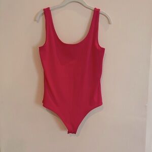 Magenta body contour body suit